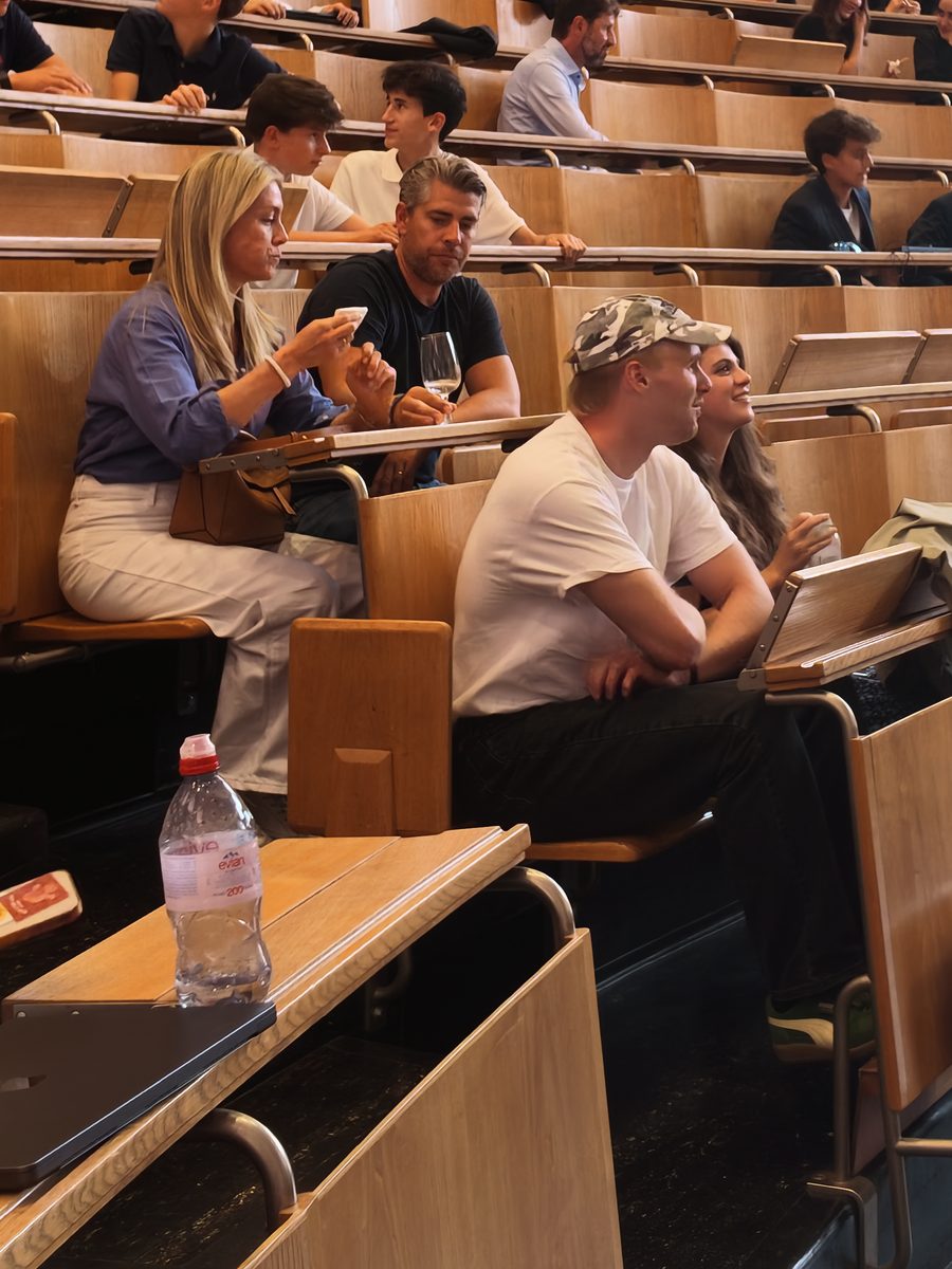 Parents watching student presentations